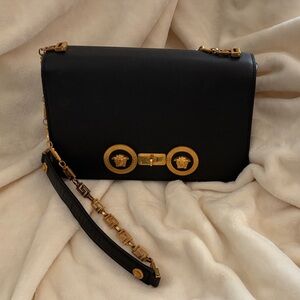 Chic Black and Gold Clutch with Chain Detail